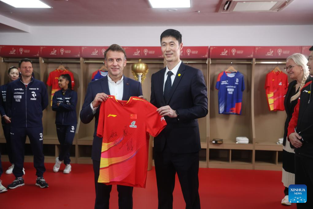 Macron meets with Chinese, French table tennis players participating ITTF Mixed Team World Cup in Chengdu